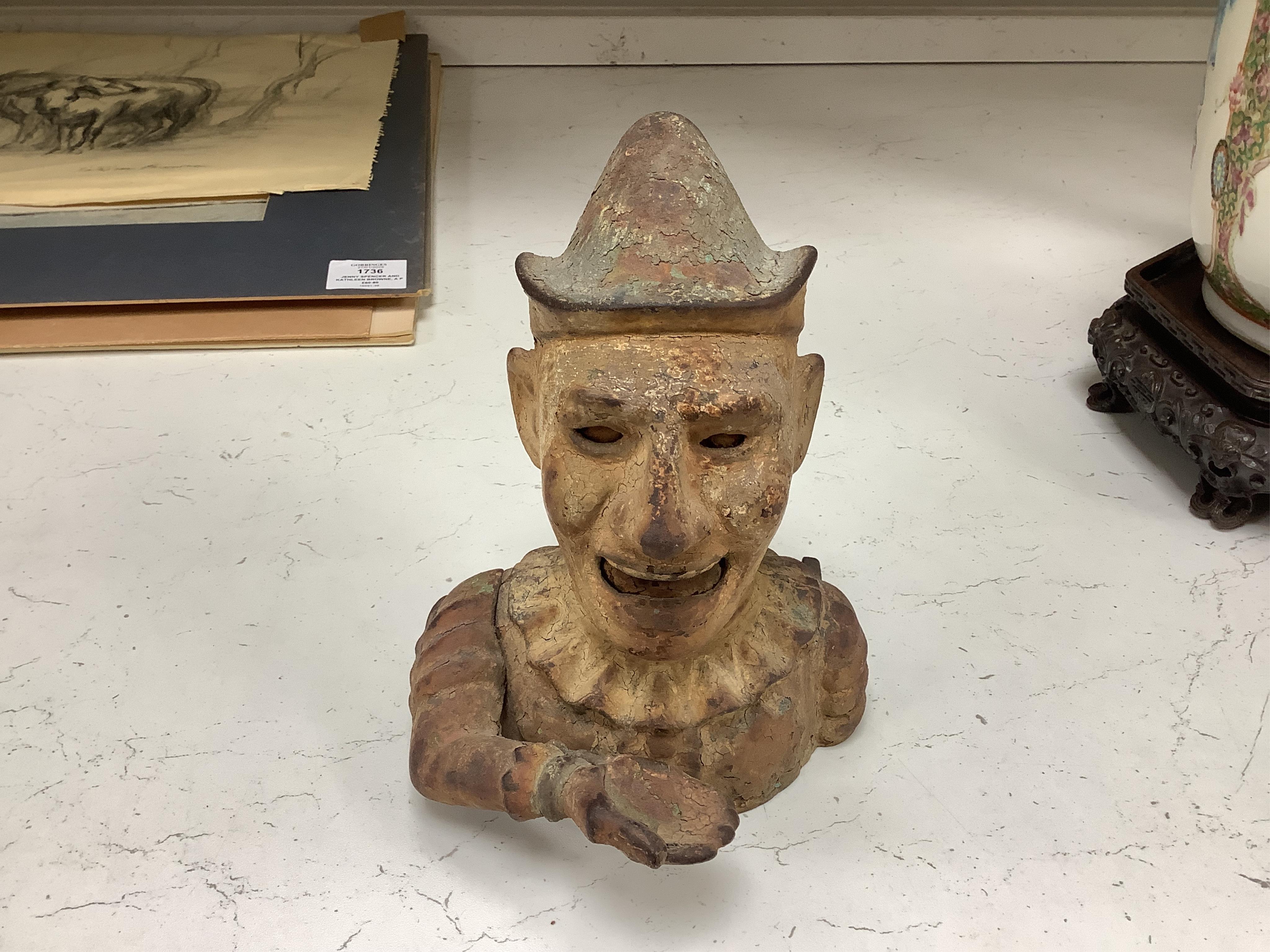 Six various metalware money boxes to include to jolly money banks, standing bear and one in the form of a crown. Condition - fair with general wear